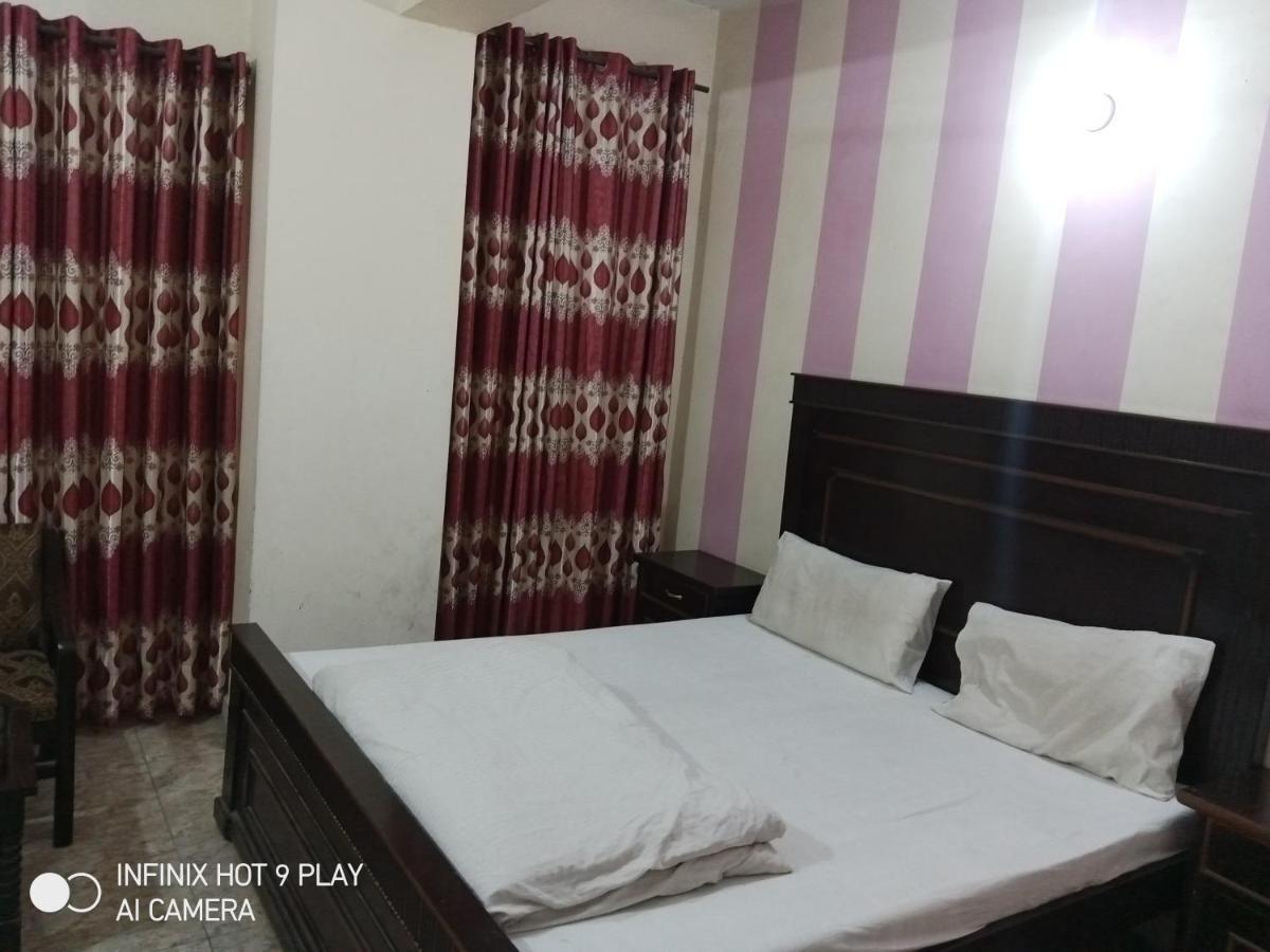 רוואלפינדי Hotel De Grand מראה חיצוני תמונה