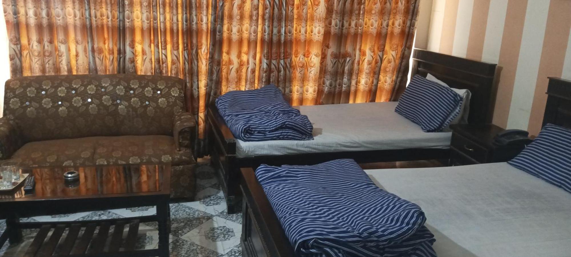 רוואלפינדי Hotel De Grand חדר תמונה