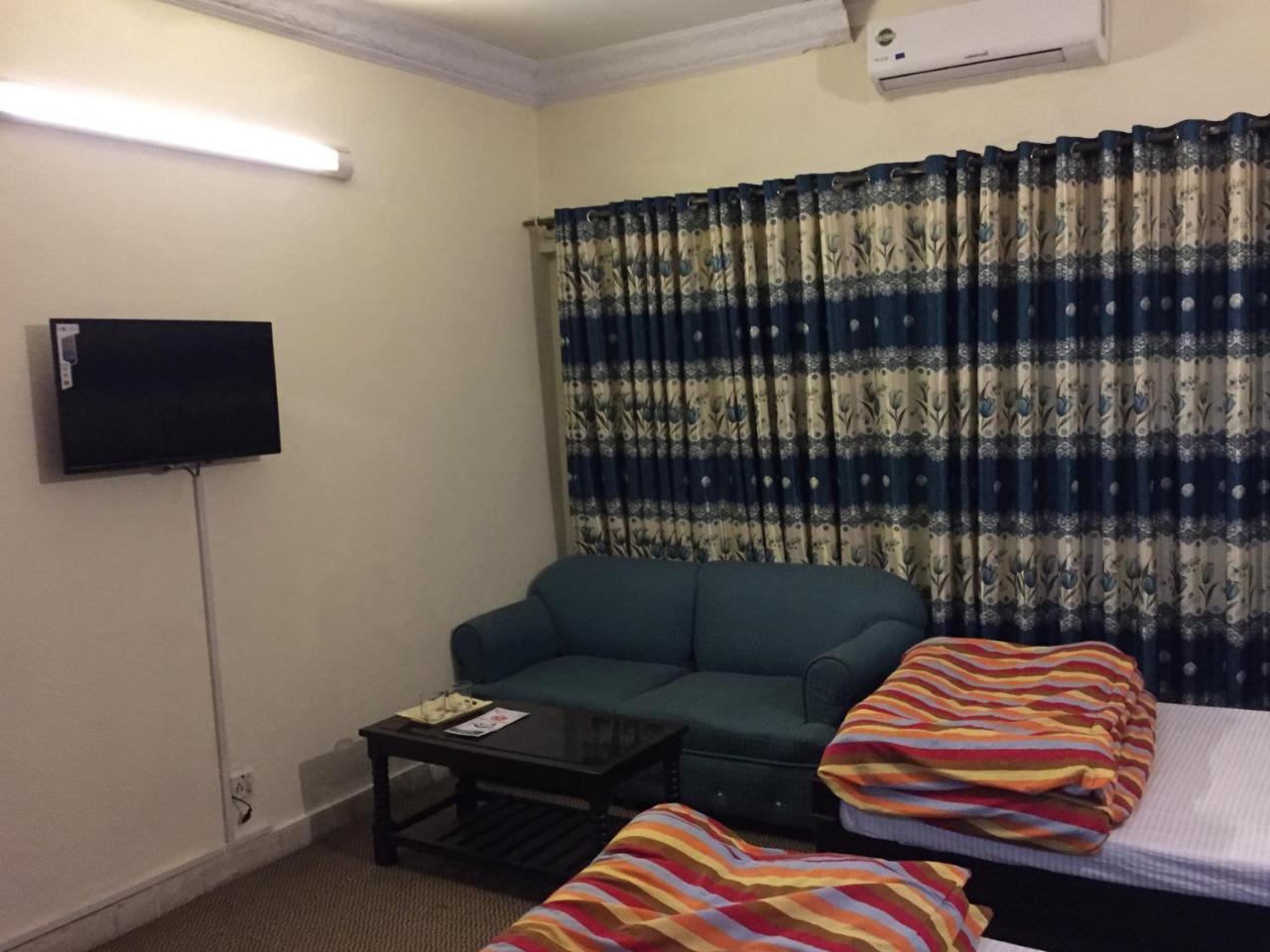 רוואלפינדי Hotel De Grand מראה חיצוני תמונה