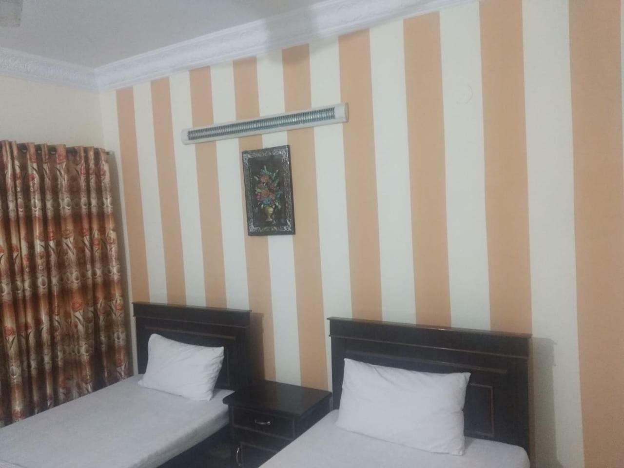 רוואלפינדי Hotel De Grand מראה חיצוני תמונה