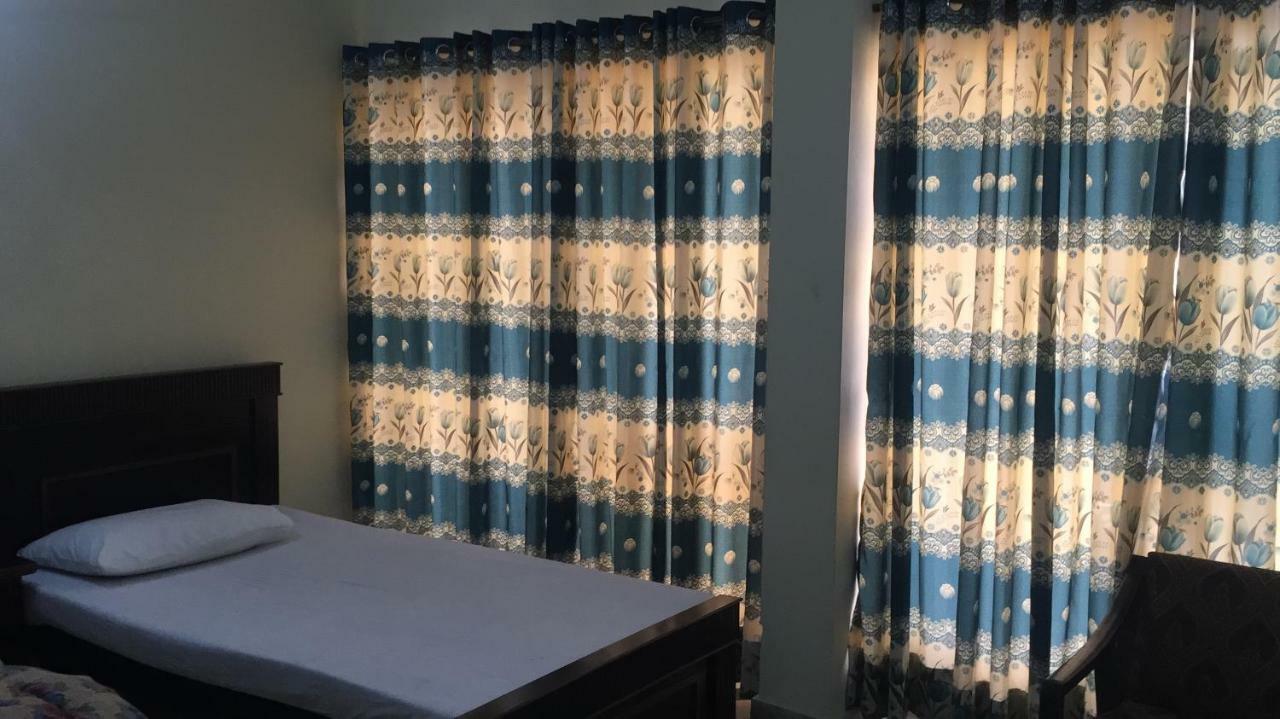רוואלפינדי Hotel De Grand מראה חיצוני תמונה