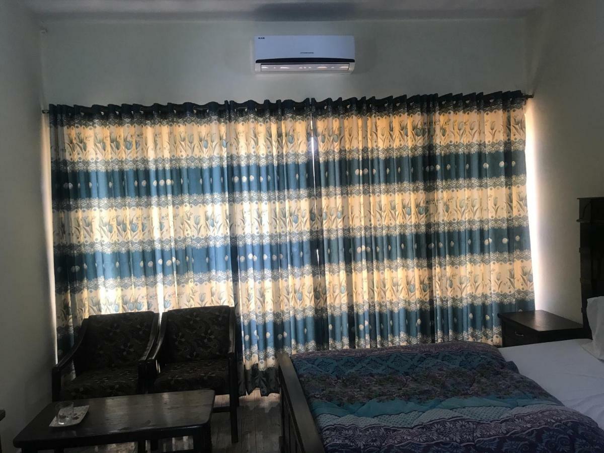 רוואלפינדי Hotel De Grand מראה חיצוני תמונה